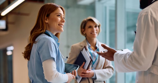 NHS PAM medical staff conversing